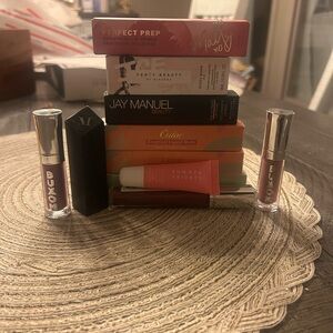 Fenty Beauty Gloss Bomb in ice and plenty more